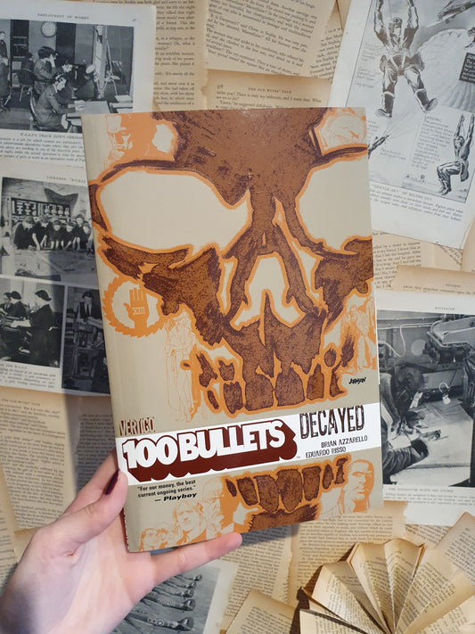 Front cover 100 Bullets Graphic Novel shows Skull