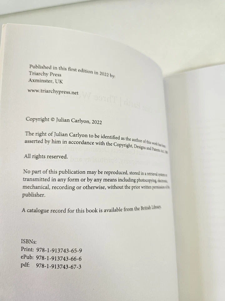 One Earth, Three Worlds by Julian Carlyon (2022)